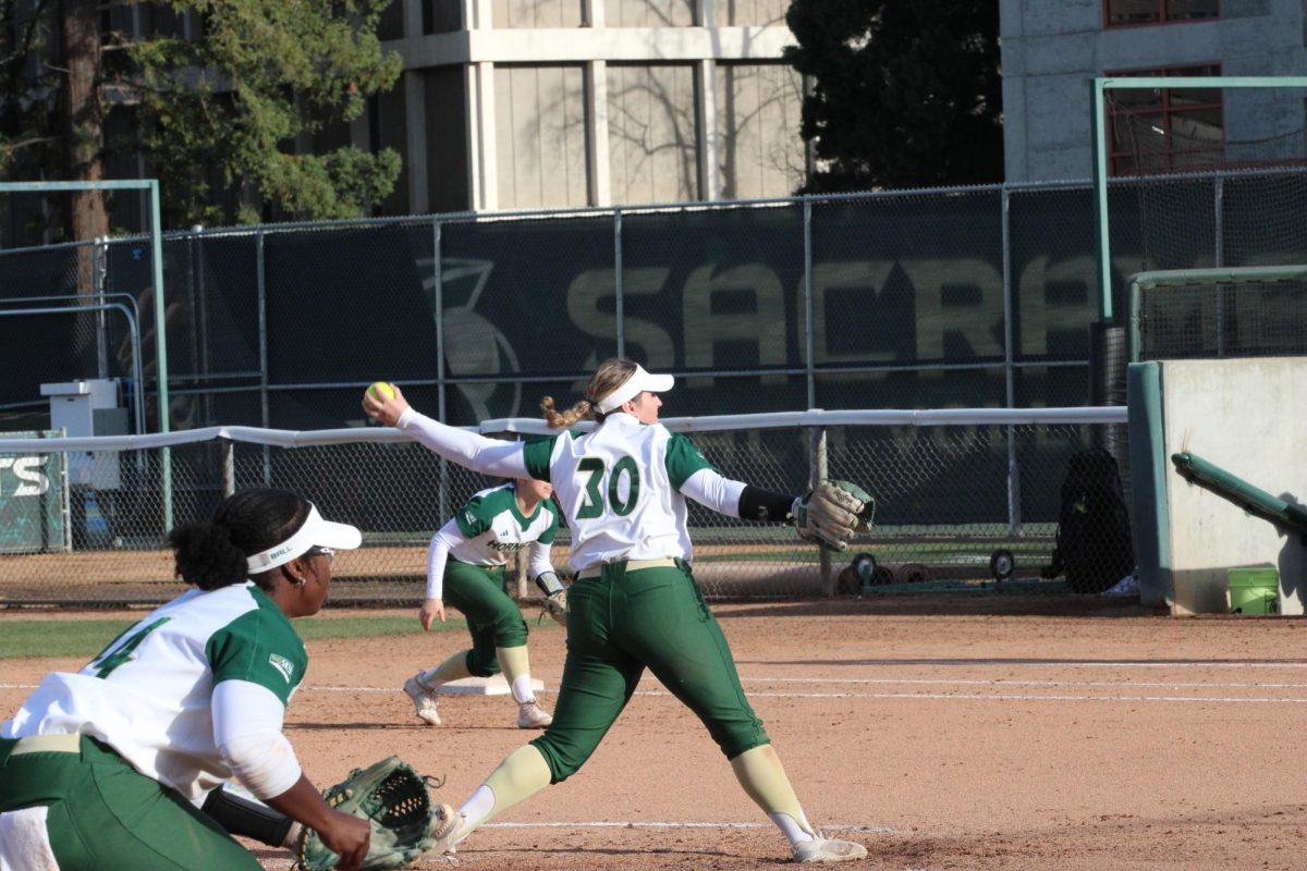 Senior pitcher Caroline Evans pitching against San Jose State Friday, Feb. 9, 2024. Evans has pitched five games for Sac State this season, more than all the other pitchers so far, and has been credited with a victory twice.