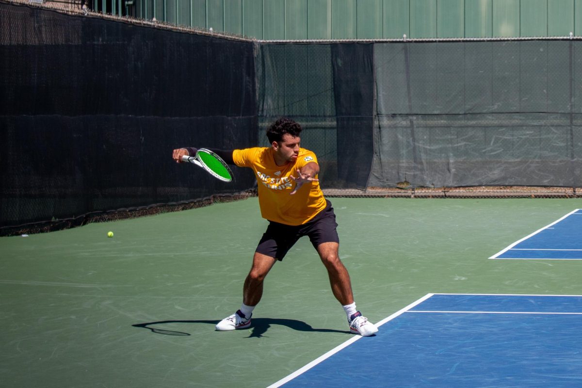Senior Mark Keki returning at the end of his singles match against Seattle University redshirt junior Jun Sasagawa on Sunday, March 17, 2024. Keki won his doubles and singles and secured the win for the Hornets 4-0.