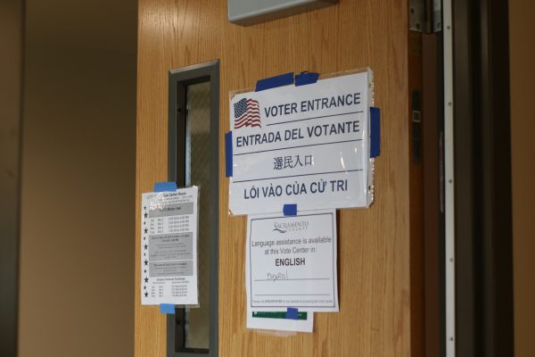  Signage notating the entrance, language assistance and hours of the vote center located in the Willow Suite, Room 1 in Modoc Hall Monday, March 4, 2024. The Vote Center is open from 7 a.m. to 8 p.m. to assist students with all their voting needs during Super Tuesday.