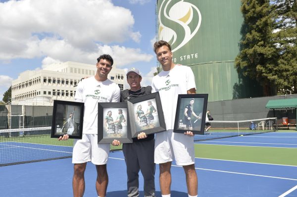 Seniors Mate Voros and Mark Keki with Sac State men’s tennis head coach Kevin Kurtz after receiving their awards for their achievements  Saturday April 6, 2024. The senior ceremony happened after their doubles match against Portland State.