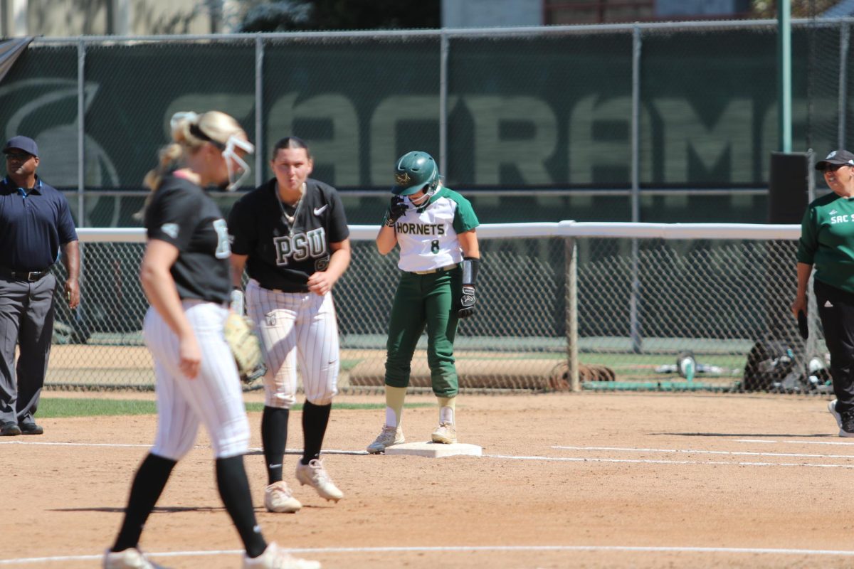 Haley Hanson standing on first at Shea Stadium against Portland State Saturday, April 12, 2024. Hanson just broke the record for career stolen bases, with 42 successful attempts.