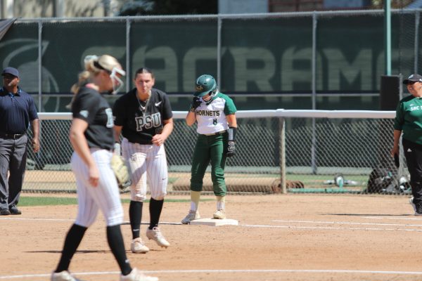 Haley Hanson standing on first at Shea Stadium against Portland State Saturday, April 12, 2024. Hanson just broke the record for career stolen bases, with 42 successful attempts.