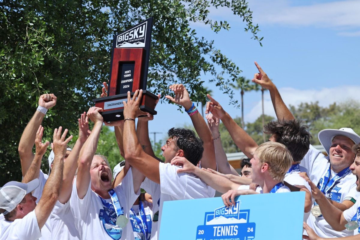 Sacramento State men’s tennis team celebrating with the Big Sky Tournament trophy on Saturday, April 27, 2024. The Hornets defeated the Northern Arizona Lumberjacks, 4-1, for the Big Sky Tournament Championship.