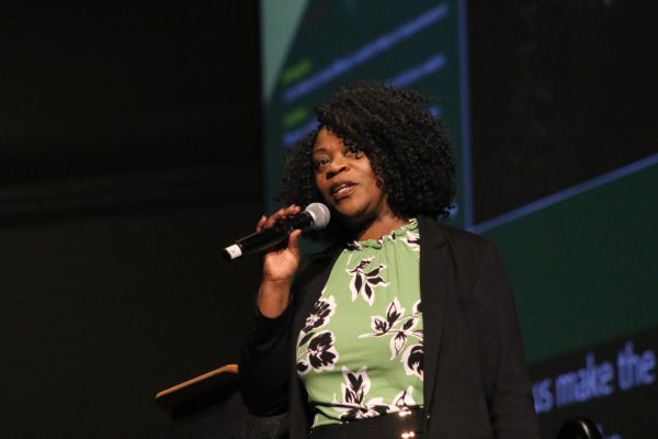 Mia Settles-Tidwell introduces a workshop session of the Antiracism and Inclusivity Campus Action Plan showcase in the Union Ballroom Monday, March 25, 2024. Settles-Tidwell has been at Sac State since 2021, serving on a number of campus initiatives as university diversity officer.