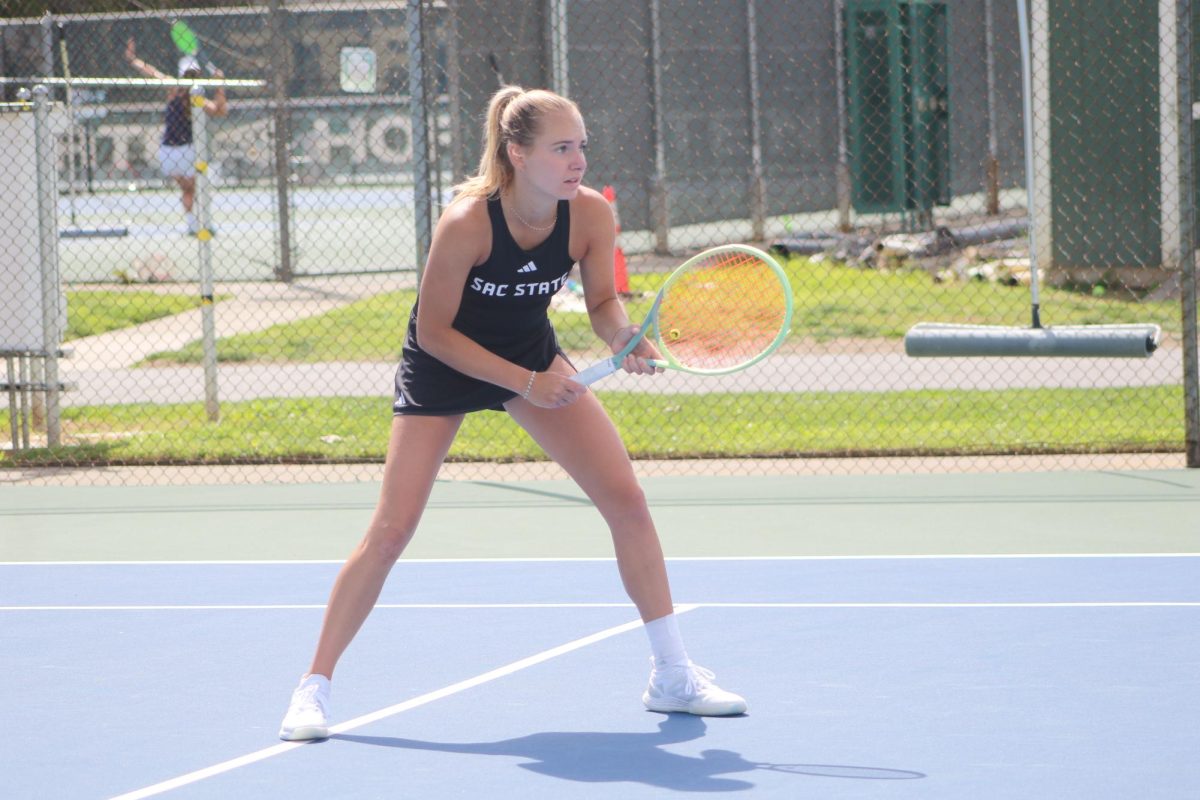  Redshirt freshman Lou Baudouin in her match against UC San Diego at the Sacramento State Tennis Courts Thursday, March 28, 2024. Baudouin recorded 18 singles wins on the season.
