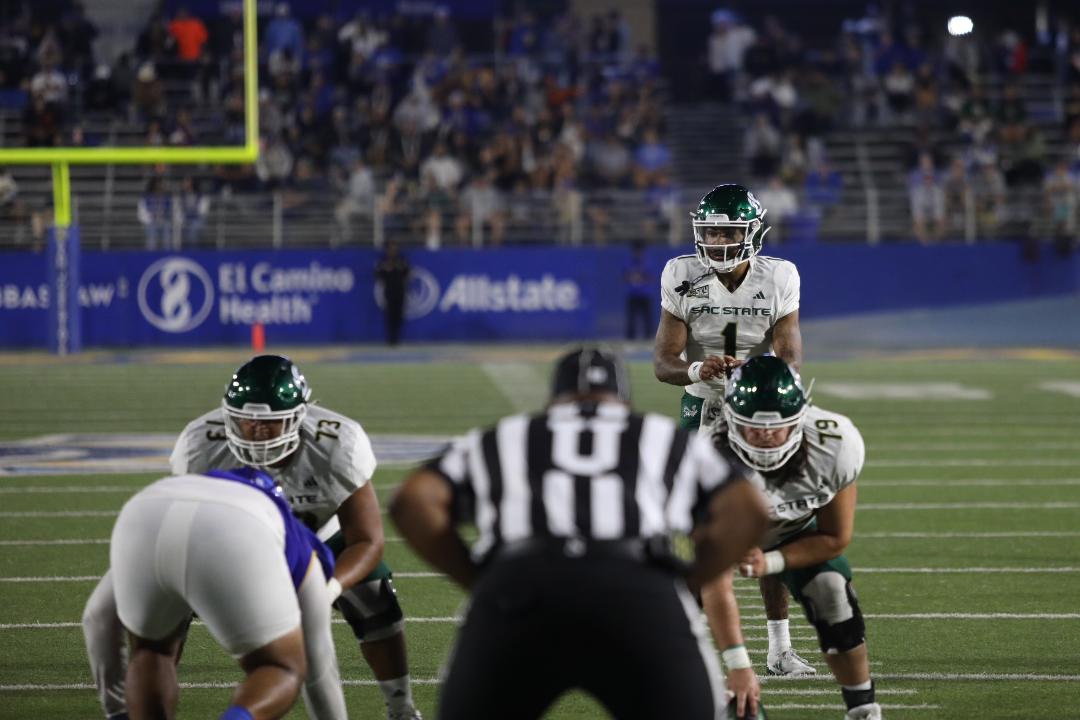 Senior quarterback Kaiden Bennett at the line of scrimmage during their 42-24 loss against the San Jose State Spartans. The Hornets had five turnovers and the pass game was inconsistent in the second half to build momentum.