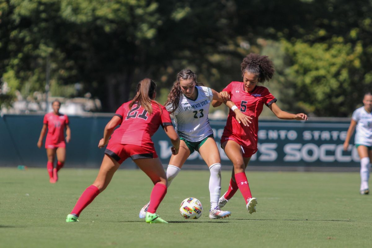 Sac State junior midfielder Madelyn Dougherty fighting for possession against two CSUN defenders Thursday Sept. 12, 2024. The Hornets won this game 1-0, with a goal in the final 10 minutes. 