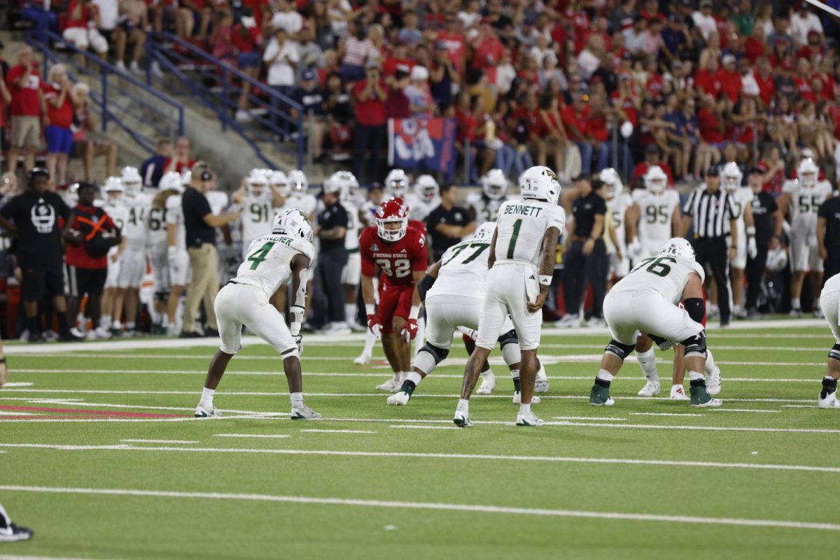 Sacramento State senior quarterback Kaiden Bennett pre-snap against the Fresno State Bulldogs. The Hornets’ final FBS matchup of the season ended in a 46-30 loss.