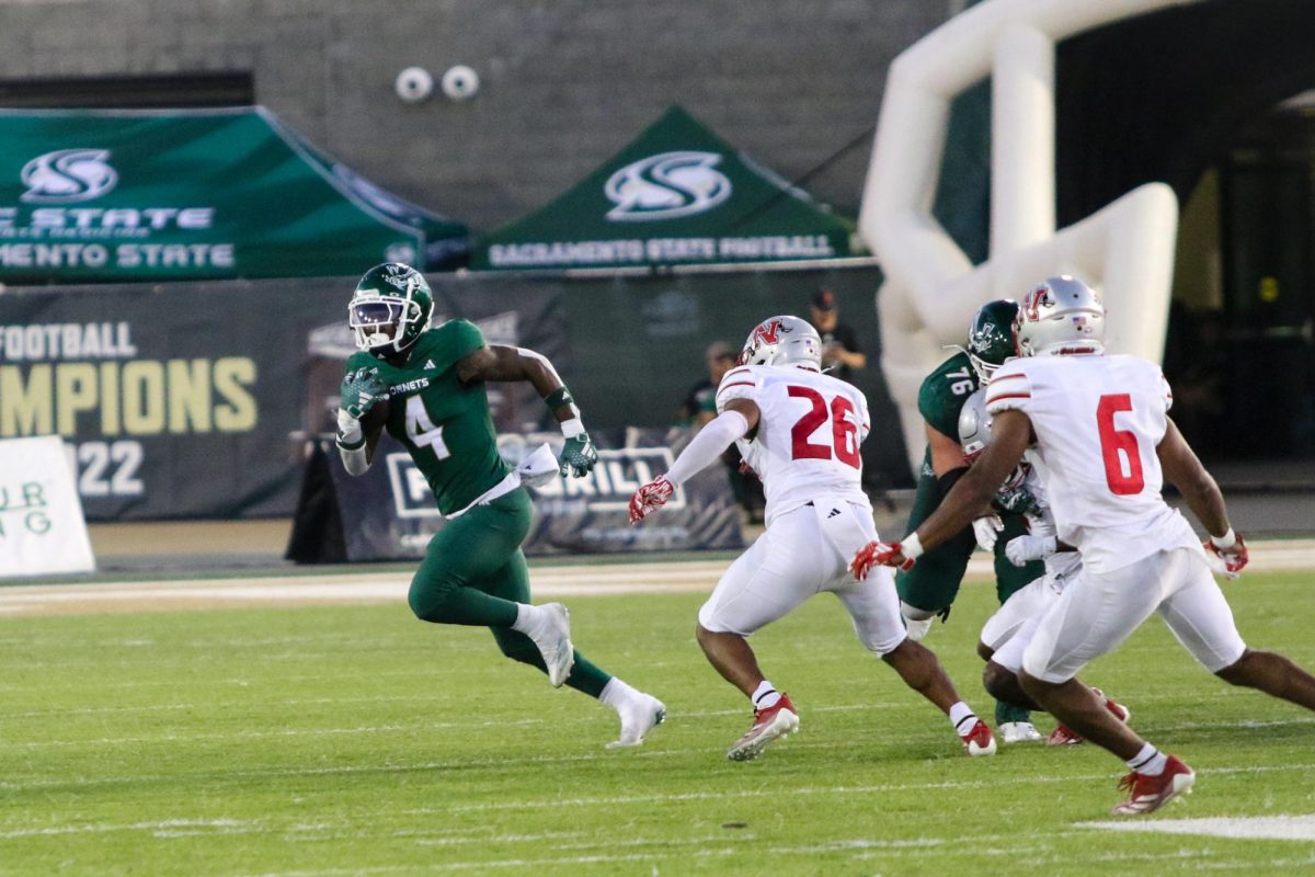 Sacramento State junior running back Elijah Tau-Tolliver running in the matchup against Nicholls Saturday, Sept. 14, 2024. Sacramento State won the game 34-7 and went on a two game win streak. 