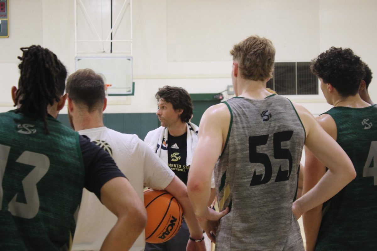 Sacramento State men’s basketball interim head coach Michael Czepil talking with his team during a practice on Wednesday, September 18, 2024. Czepil has acted as associate head coach twice in NCAA Division 1 Men’s Basketball, but has never owned the title of head coach.