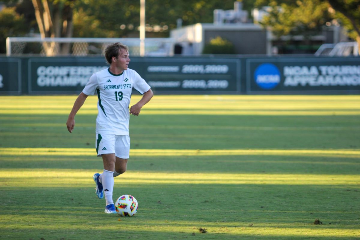 Sac State sophomore defender Zac Giles brings the ball up the pitch against the University of Pacific Tigers Sunday, Sept. 22, 2024. The Hornets ended the match against the Tigers in a tie.