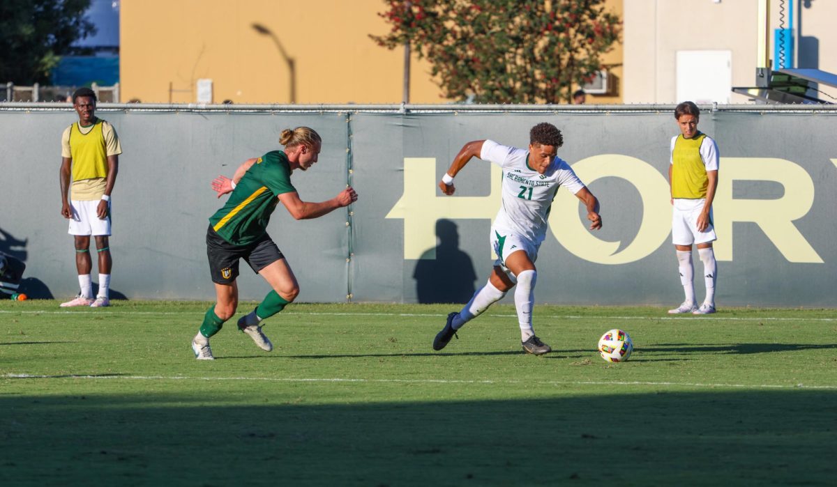 Sac State sophomore forward Donovan Sessoms with the ball against the San Francisco Dons Thursday Sept.12, 2024 . The Hornets went on to win the game 1-0 for their first win of the season.