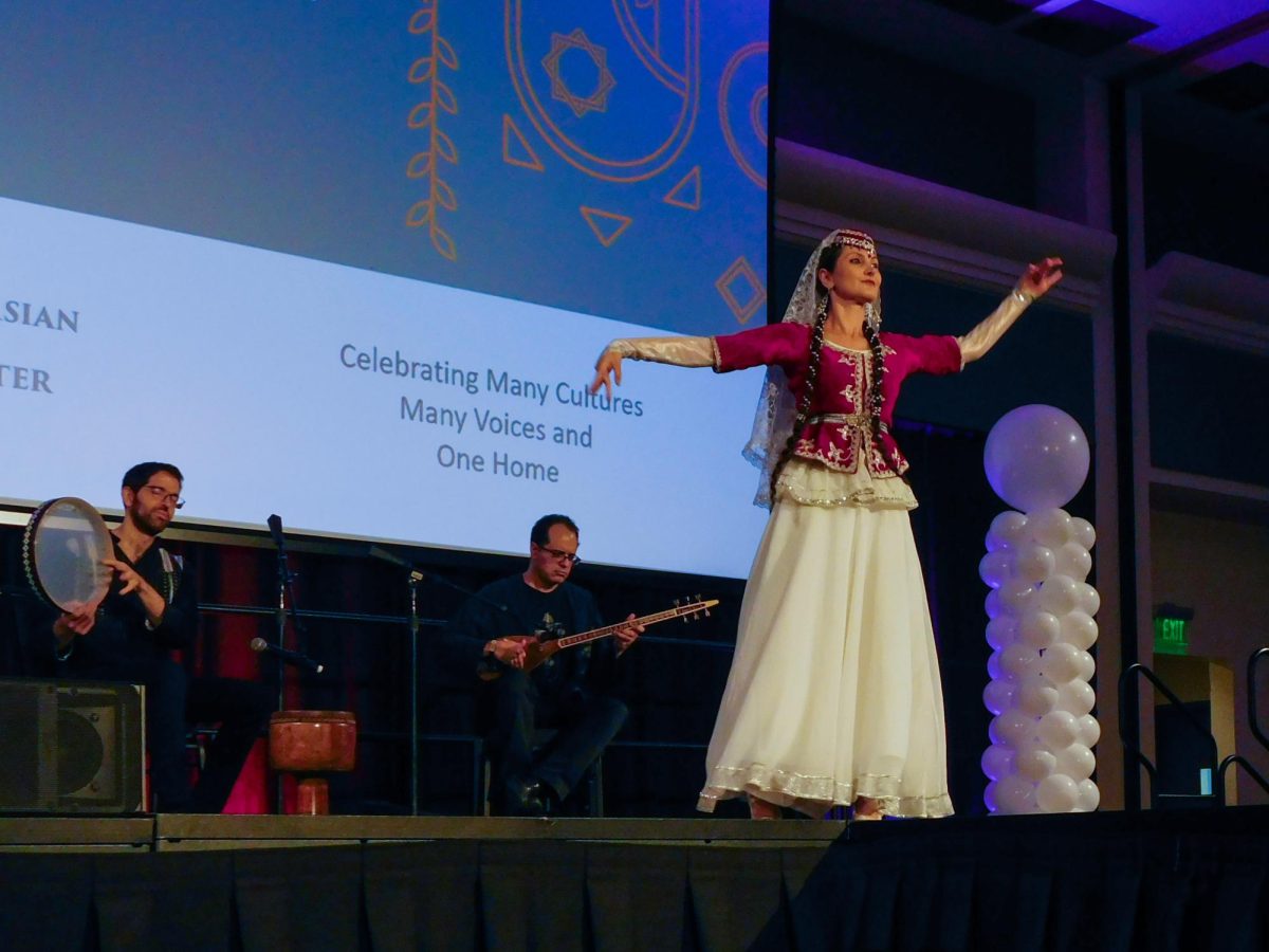 Iranian percussionist Nariman Assadi accompanied by a dancer, whose dreamlike spinning and whirling movements mesmerized the crowd at the University Union Ballroom Sept. 10. 2024. Traditional Iranian percussionist music was featured as a SWANA cultural display.