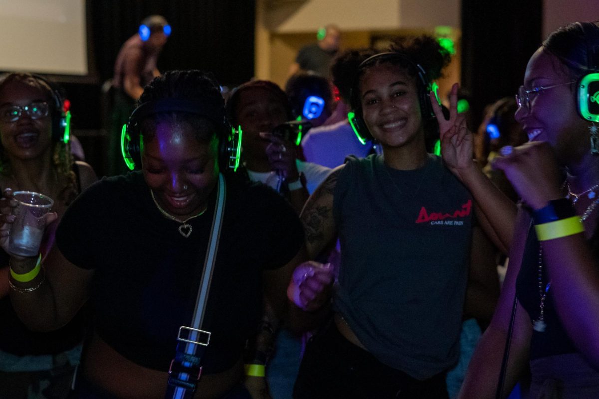 Attendees enjoy the hip hop music on the green channel provided by DJ Jay Hernandez, Sept. 5, 2024. Hernandez referred to his listeners as the “green goblins” whenever a popular song he knew listeners would like was next.