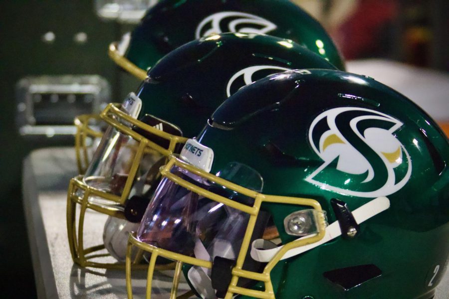 Sacramento State football helmets lined up on the bench Saturday, Oct. 22, 2022. Sac State is looking to make the move from the Big Sky Conference to the Mountain West Conference or Pac-12.