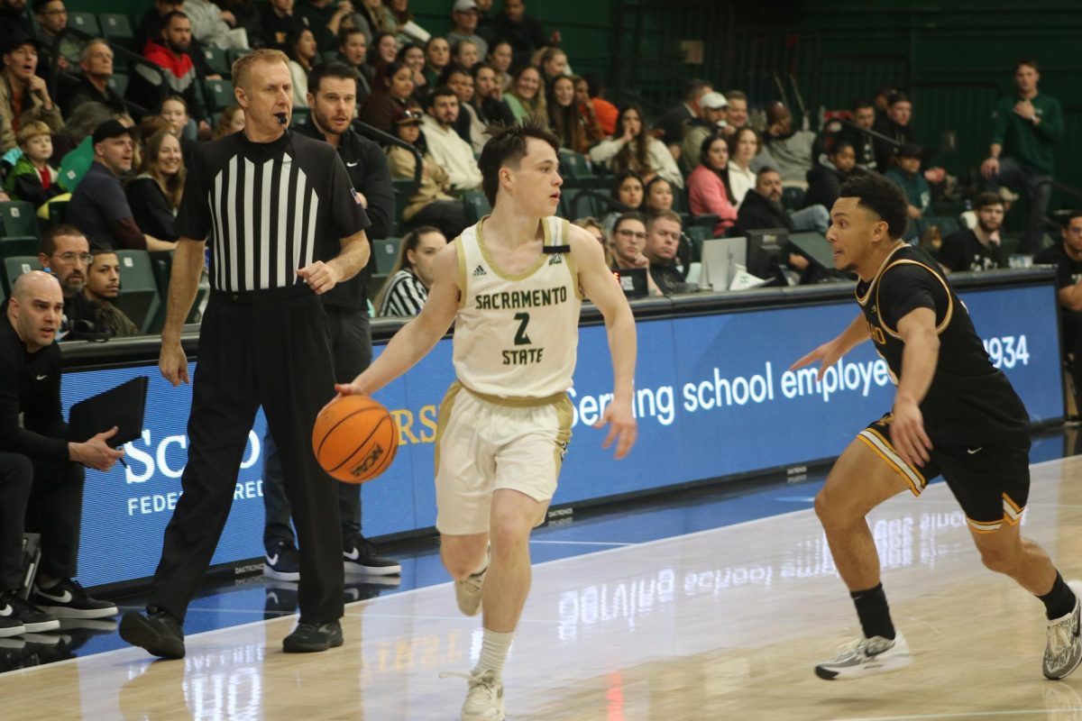 Freshman guard Bailey Nunn dribbles past an Idaho defender in a conference game Monday, Feb. 5, 2024. Sac State head coach Michael Czepil said Nunn is a skilled offensive player and will help the Hornets a lot this season.