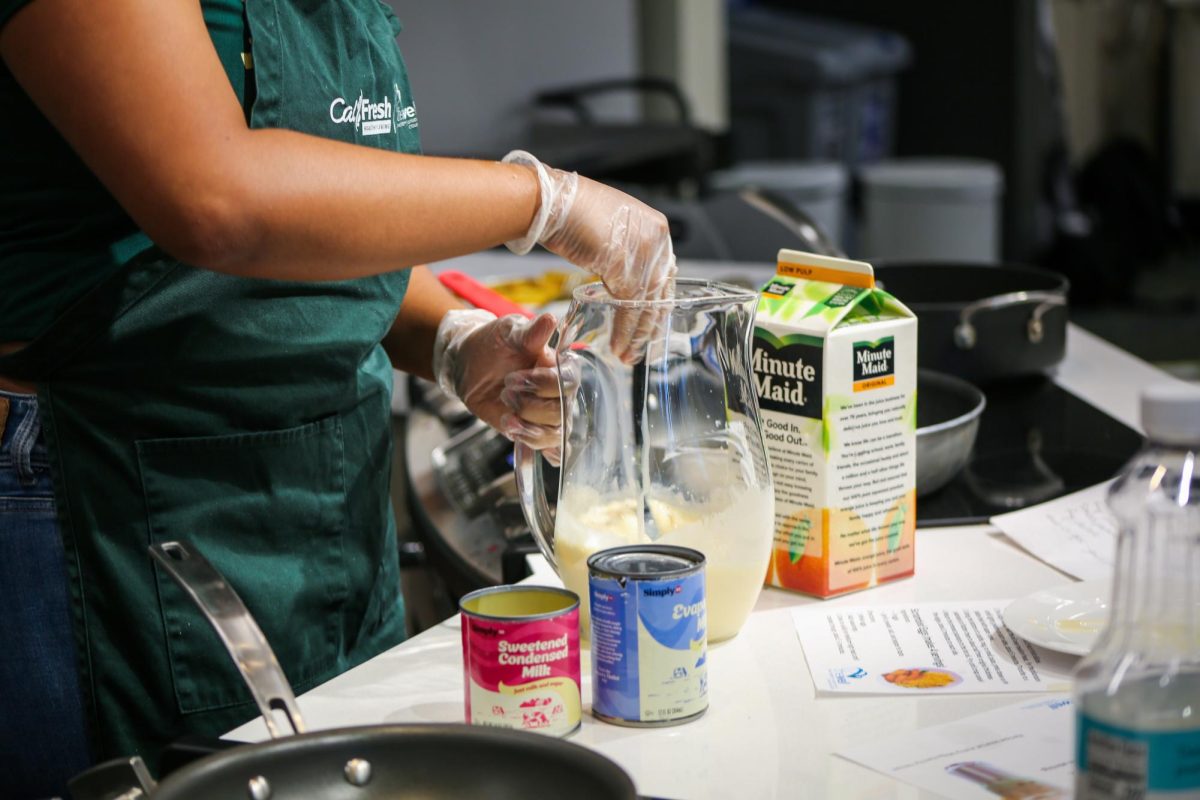 Guest Chef Ashly Mejia-Ferreras showed attendees how to make morir soñando Sept. 24, 2024. Mejia-Ferreras shared that the lime juice needs to be added last or the milk will curdle in the drink.