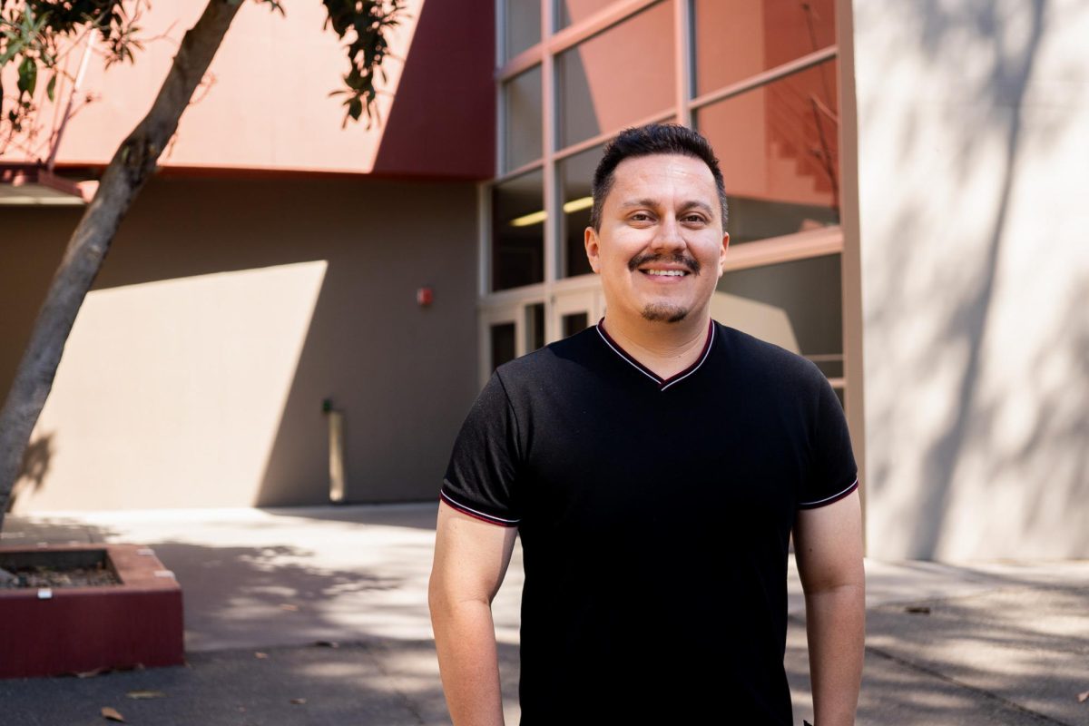 Sac State’s Folklórico instructor and choreographer, Osvaldo Ramírez Vidales, stands in front of Shasta Hall Wednesday, Oct. 2, 2024. Ramírez has been dancing Folklórico for 25 years and has been the sole Sac State Folklórico dance instructor for 15 years.