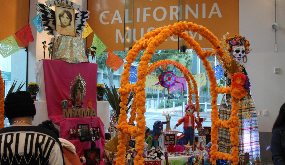 A large altar sits near the entrance to the California Museum Saturday, Oct. 12, 2024. The altar was erected by local restaurateur Ernesto Delgado in honor of his mother.