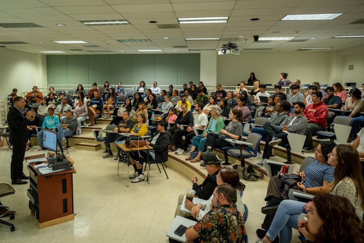 A crowd of attendees sits for a screening and panel of the documentary “The Right to Exist” on Wednesday, Oct. 16, 2024. Attendees were able to ask questions to a panel which featured the film’s director and others who appeared in the film.