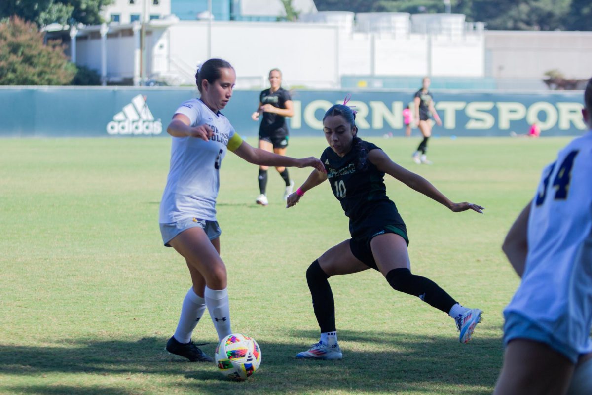 Senior midfielder Abigail Lopez dribbling the ball around a Northern Colorado defender Sunday, Oct. 13, 2024. The Hornets went on to draw against the Bears 1-1.