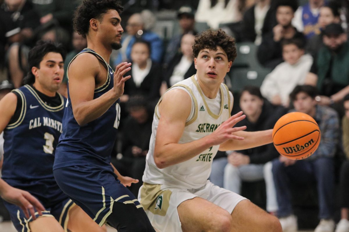 Sophomore guard Alex Kovatchev drives past a Cal Maritime defender Tuesday, Nov.5, 2024. Kovatchev scored 8 of his 13 points in the second half.