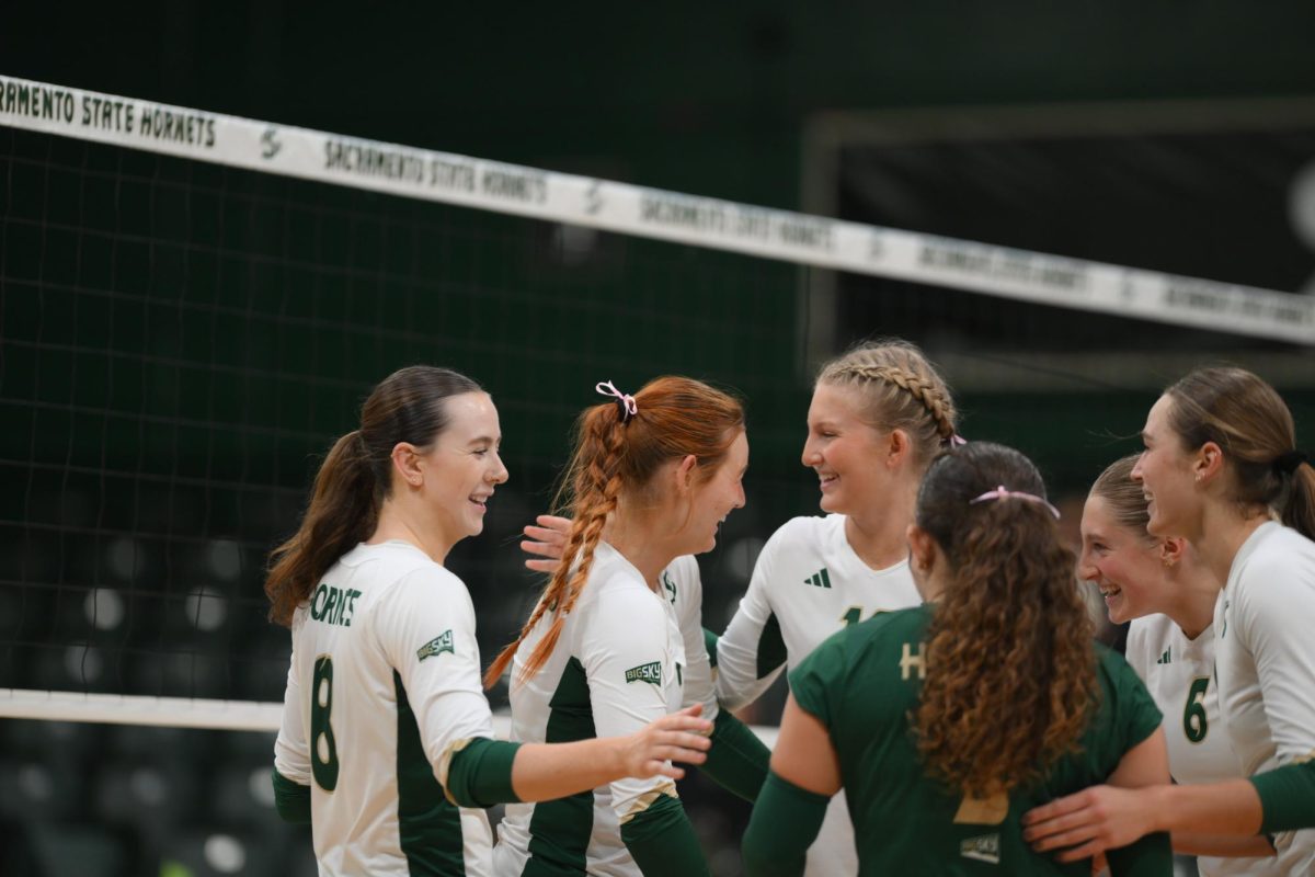 Sacramento State volleyball in a huddle during their match against the Idaho Vandals Thursday, Oct. 31, 2024 in The Nest. The Hornets swept the Vandals 3-0 and led in every statistical category.