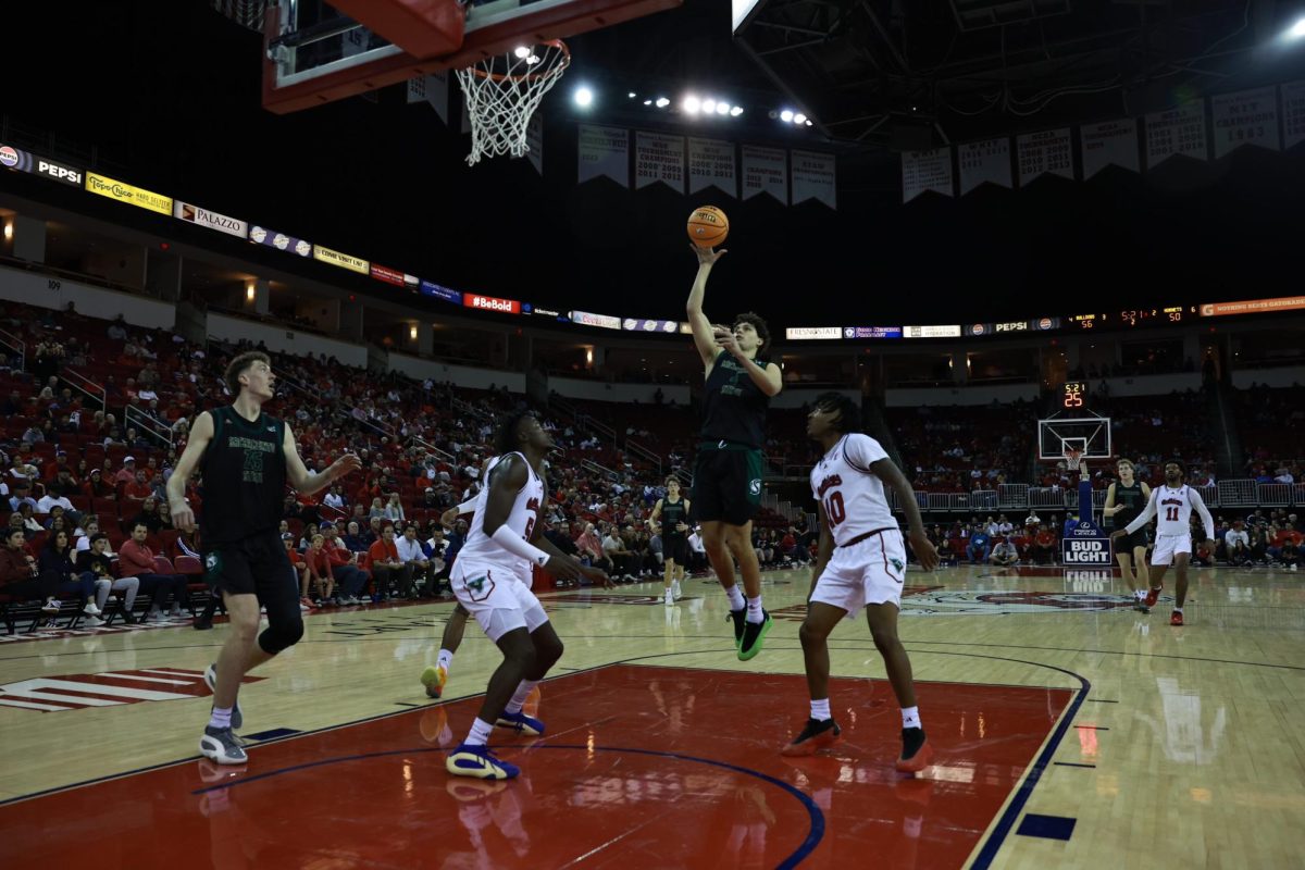 Sacramento State sophomore forward Alex Kovatchev attempts a shot in the paint in Sac State’s loss to Fresno State Friday Nov. 8, 2024. Kovatchev had a team-high seven rebounds. 