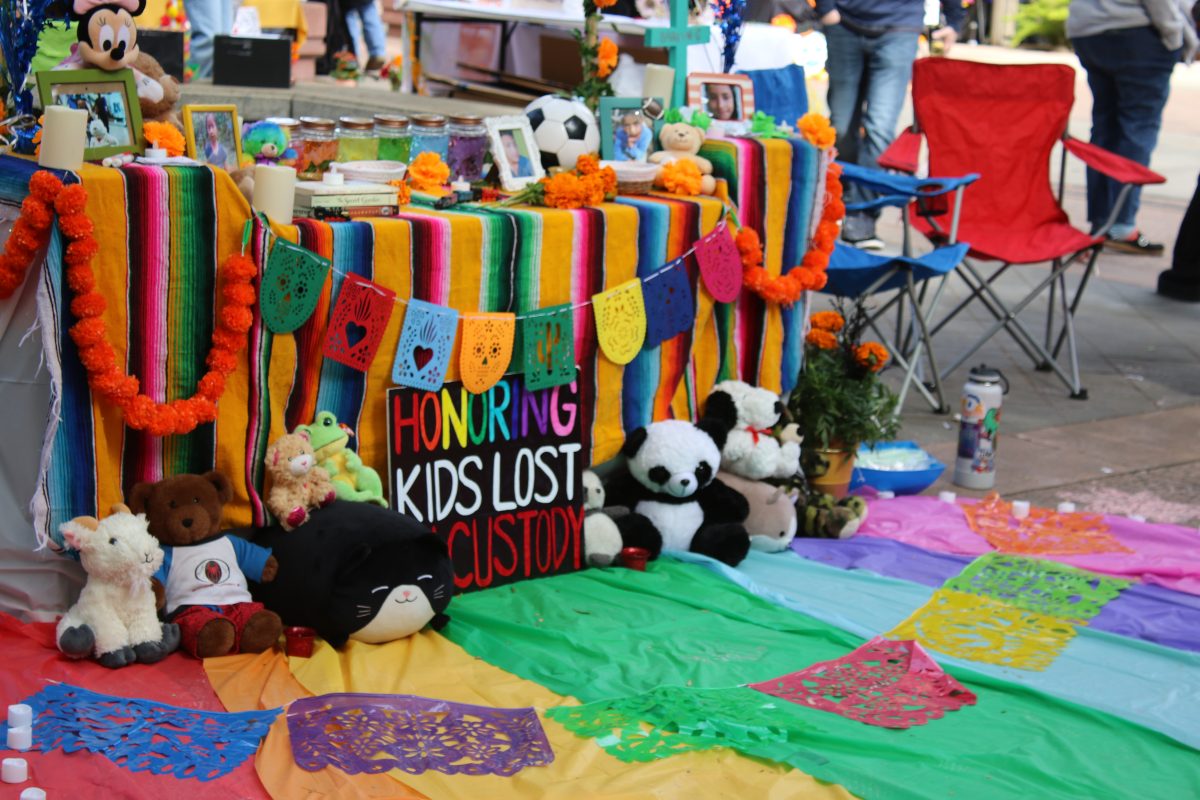 One of the ofrendas set up in the library quad for Día de los Muertos, honoring the lives of children lost to U.S. custody Wednesday, Oct. 30, 2024. Ofrendas for children are often lined with toys and other memorabilia that children typically would enjoy, such as stuffed animals. 