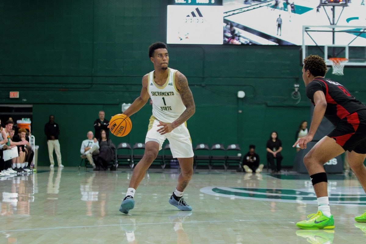 Junior forward Jalen Pitre attempts a pass against CSUN Saturday, Nov. 16, 2024. Pitre had five points and five rebounds in the loss to the Matadors.