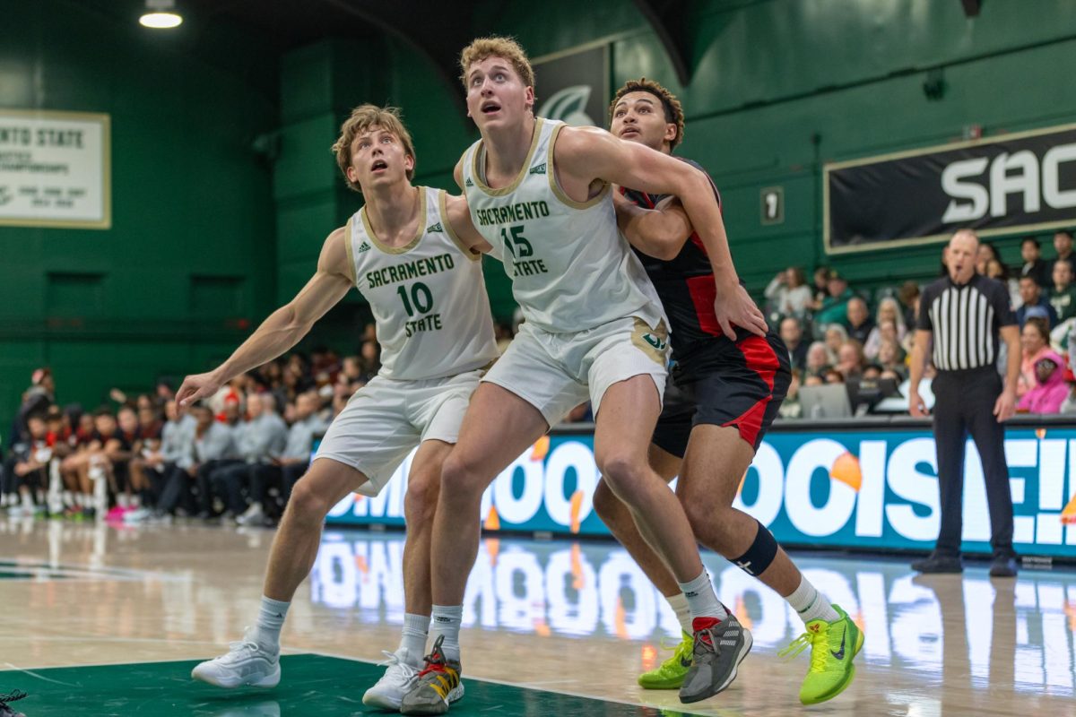 (L-R) Sophomore guard Emil Skytta and senior forward Jacob Holtfend off a CSUN Matador defender Saturday, Nov. 16, 2024. Holt had a career-high 20 points in the game.