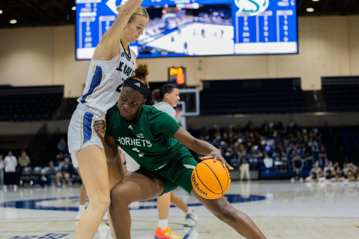 Freshman forward Brooklyn Taylor backs down a defender against UC Davis Wednesday, Nov. 20, 2024. Taylor averages 4.5 points per game this season.