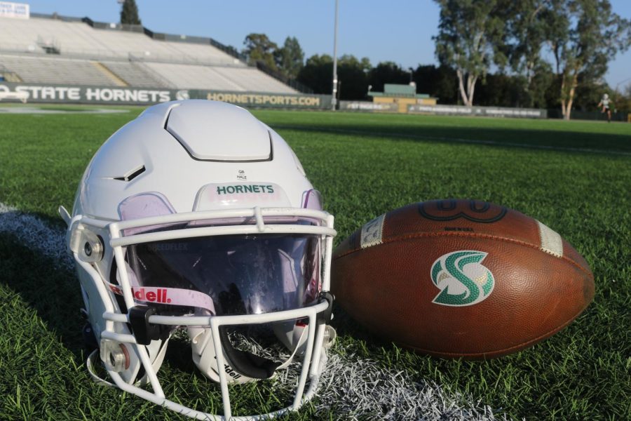 Sacramento State football equipment lies on the grass at Hornet Field. The Hornets hired UNLV offensive coordinator Brennan Marion to become their new head coach for the upcoming 2025 season.