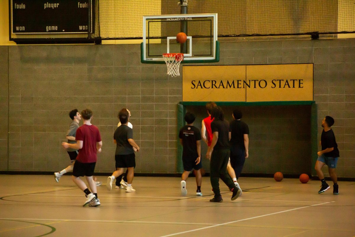 Students playing basketball in the Multi-use Activity Court, the new home for recreational basketball Wednesday, Jan. 29, 2025. The WELL’s closure of the Gym Box limits the times students can participate in their recreational activities.