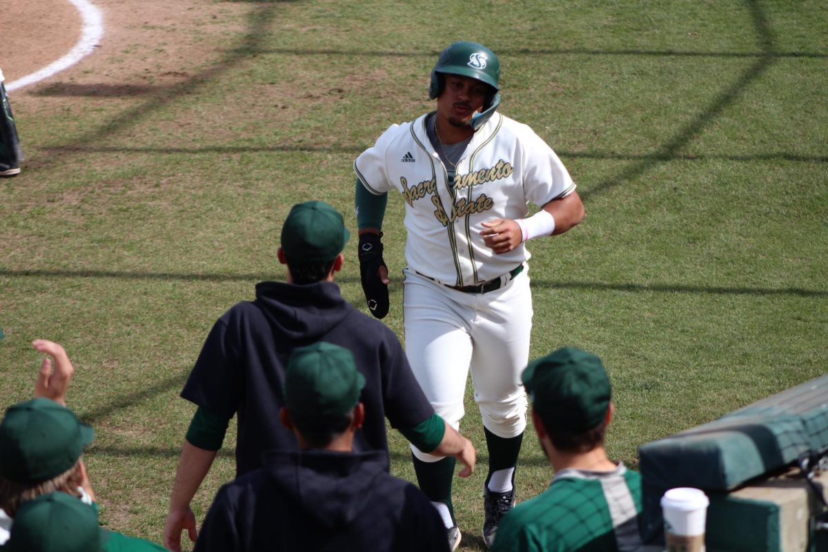 Senior infielder JP Smith is greeted by his team on his way back to the dugout Sunday, March 10, 2024. Smith hopes to have another strong season, looking to add to his career 36 home runs, the 9th most career home runs for a Hornet.