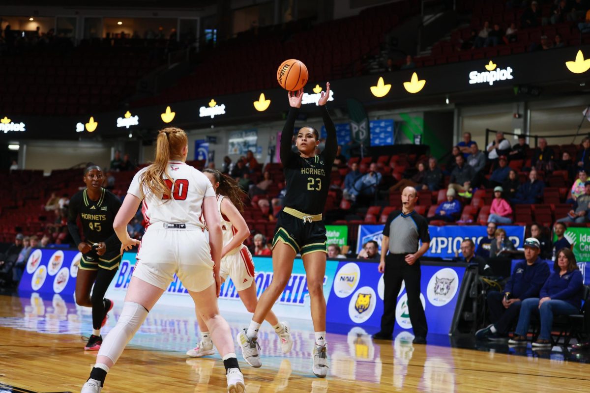 Senior forward Jaydia Martin lines up a three March 8, 2025. Martin had a game-high 26 points and 10 rebounds. 