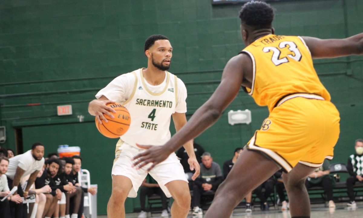 Sac State assistant men’s basketball coach Zach Chappell getting up the court against Long Beach State Saturday, Dec. 10, 2022, in The Nest. Chappell hit a go-ahead layup to win the game for the Hornets.