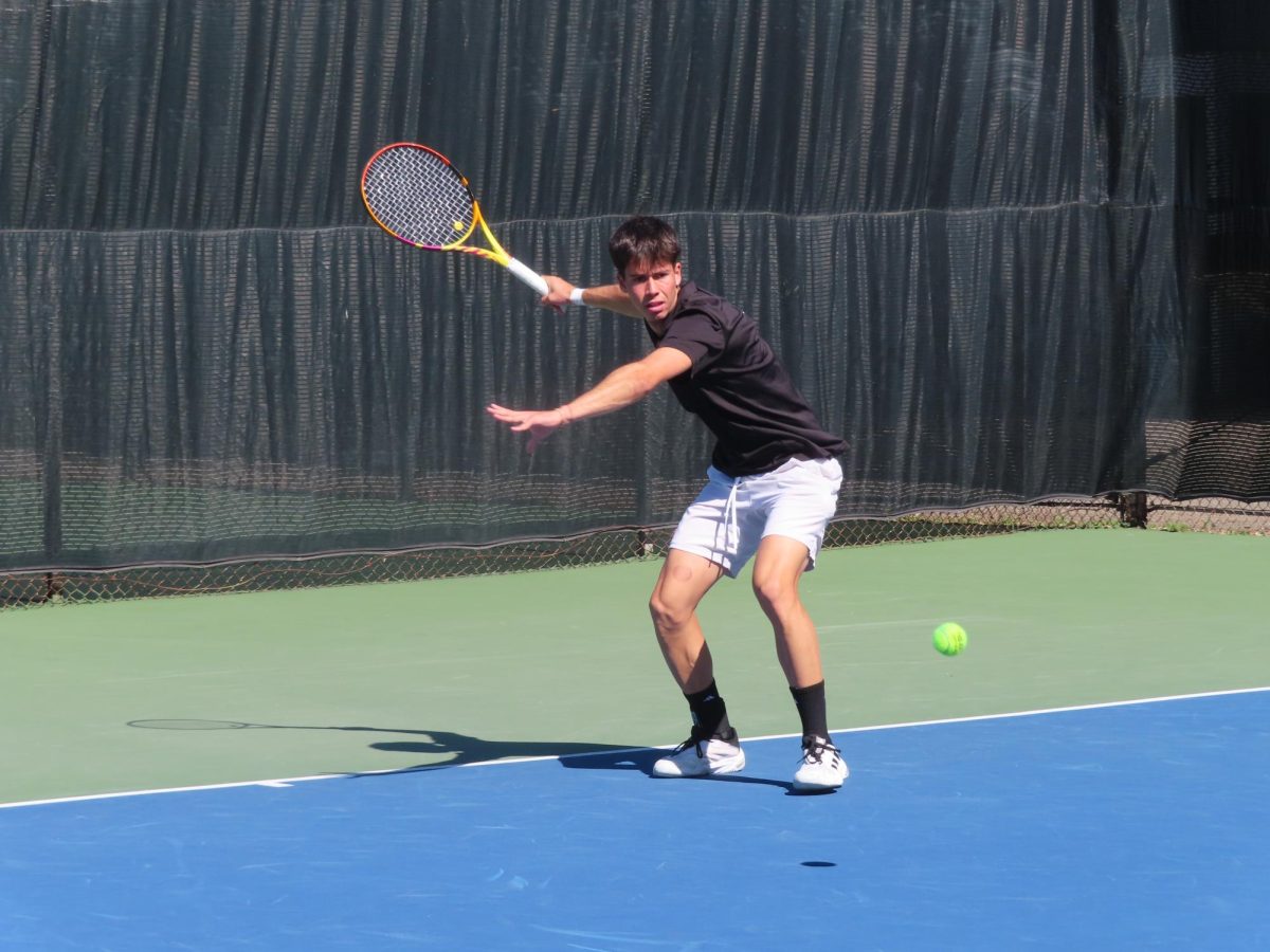 Freshman Gur Libal looks to return the ball with forehand motion against New Mexico State Friday, March 7, 2025. Libal’s doubles went unfinished at first, as the Hornets won the doubles point at second and third that led to the 5-2 victory.