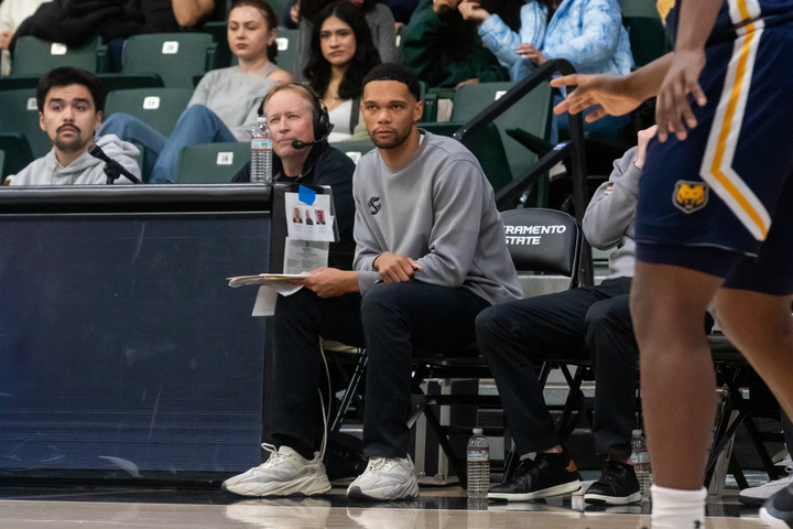 Sac State assistant men’s basketball coach Zach Chappell prepares for gametime Thursday, Feb. 13 2025. Chappell is in his first season as a college basketball coach.