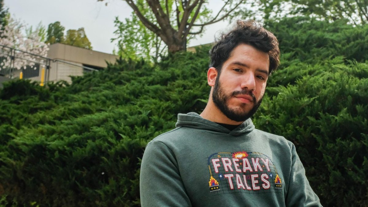 Mike Infante posed for the camera in front of greenery at Sacramento State March 28, 2025. Infante gained media attention through performing in bodybuilding competitions and has since made it to the big screen playing Nick in the recently released “Freaky Tales.”