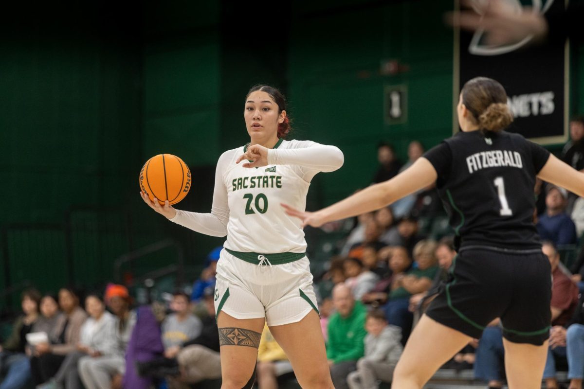 Senior forward Katie Peneueta directs traffic against Portland State, March 3, 2025. Peneueta finished the game with five blocks and six points.