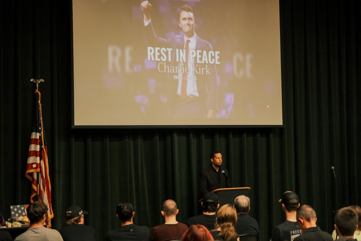 President Luke Wood speaking to the crowd assembled in the Redwood Room for the vigil of Charlie Kirk at the Student Union on Friday, Sept. 12, 2025. The vigil hosted almost 100 people, some of whom gave speeches in remembrance of Kirk and his impact on the conservative community.
