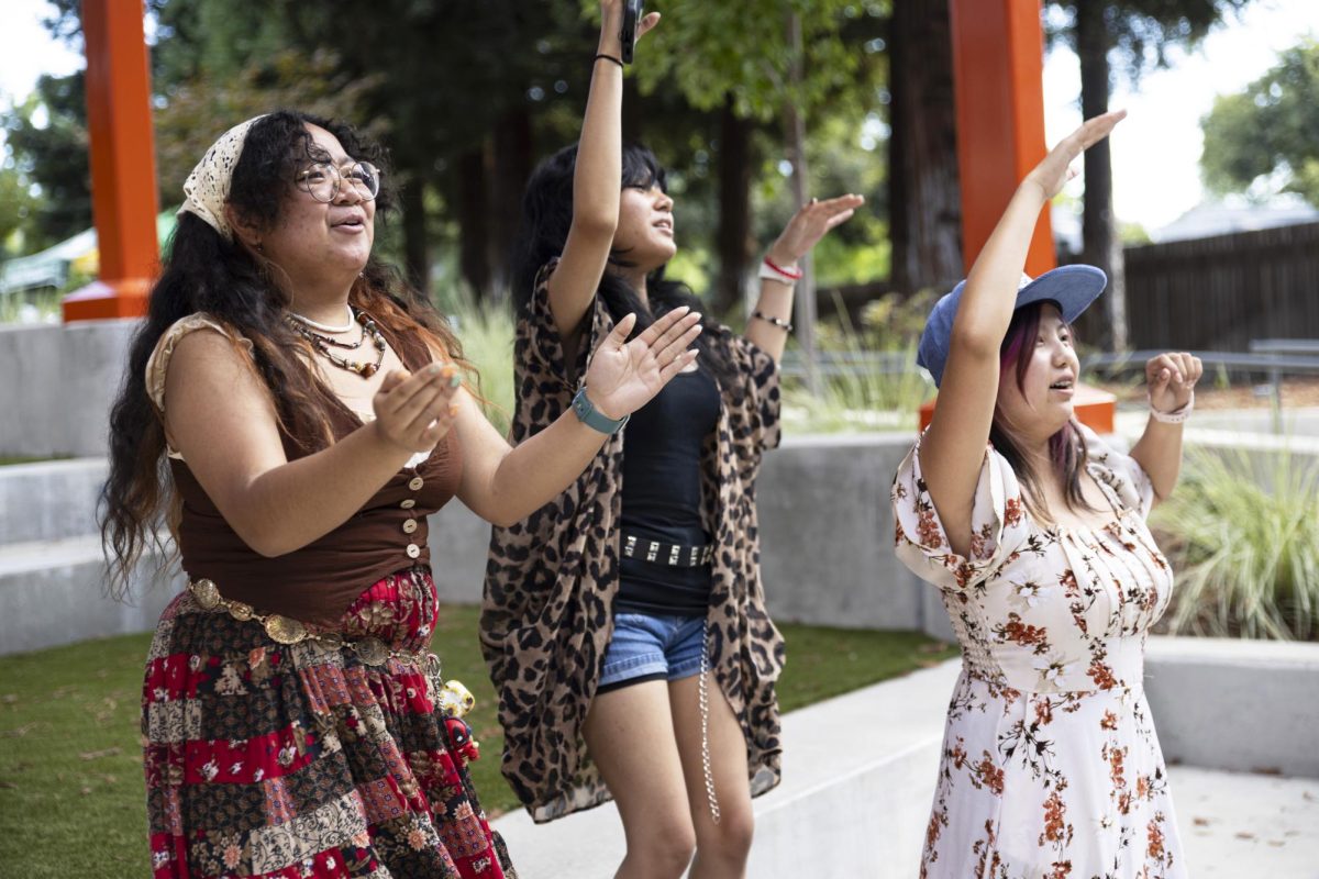 A group of students dance together to Karega Bailey’s performance Thursday, Sept. 11, 2025. The free event allowed students to experience music performances from a variety of artists without worrying about finances.