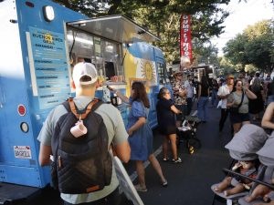 Crowds gather at the Our Street Night Market to grab a bite, listen to beats and enjoy the vibes Saturday, Sept. 6, 2025. From food trucks to live DJ sets, there were various ways to experience downtown nightlife.
