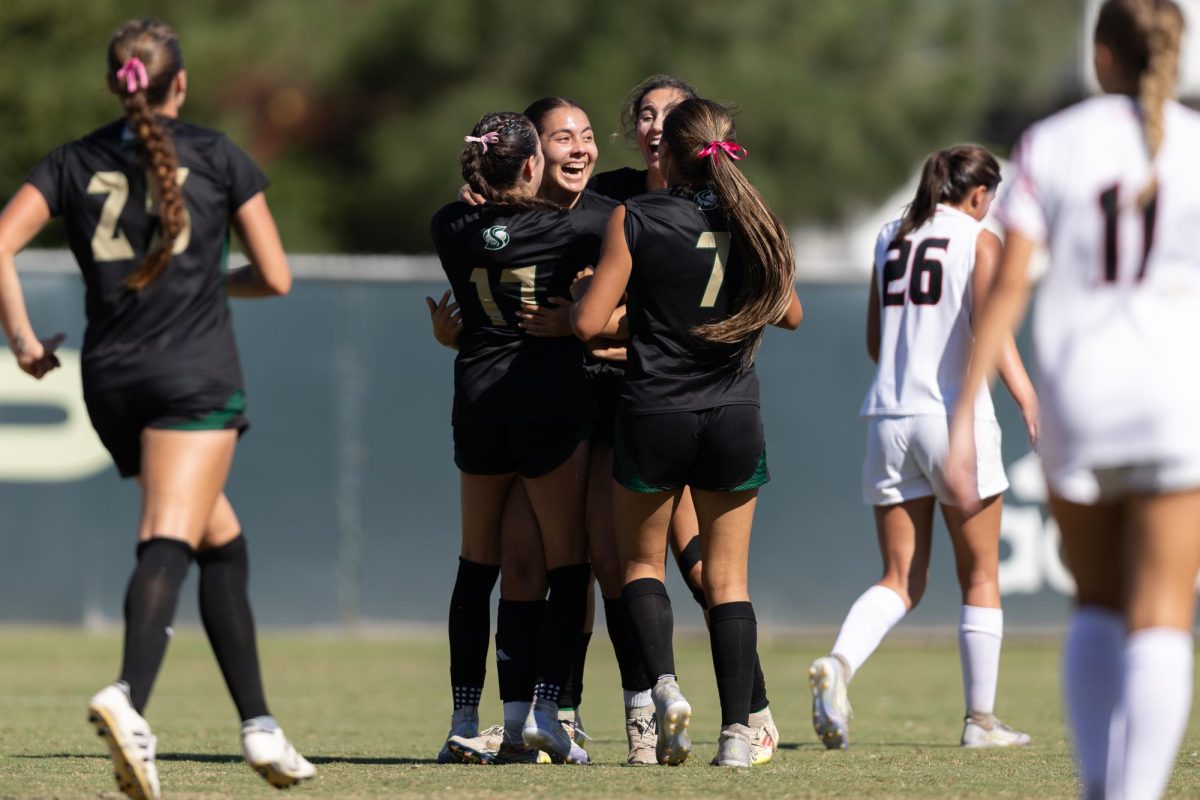 Embraced by her teammates, freshman defender Aryana Martinez gets her first goal with the Hornets against Eastern Washington Sunday, Oct. 5, 2025. Stepping up due to injuries, Martinez has been vital for the Hornets this season.