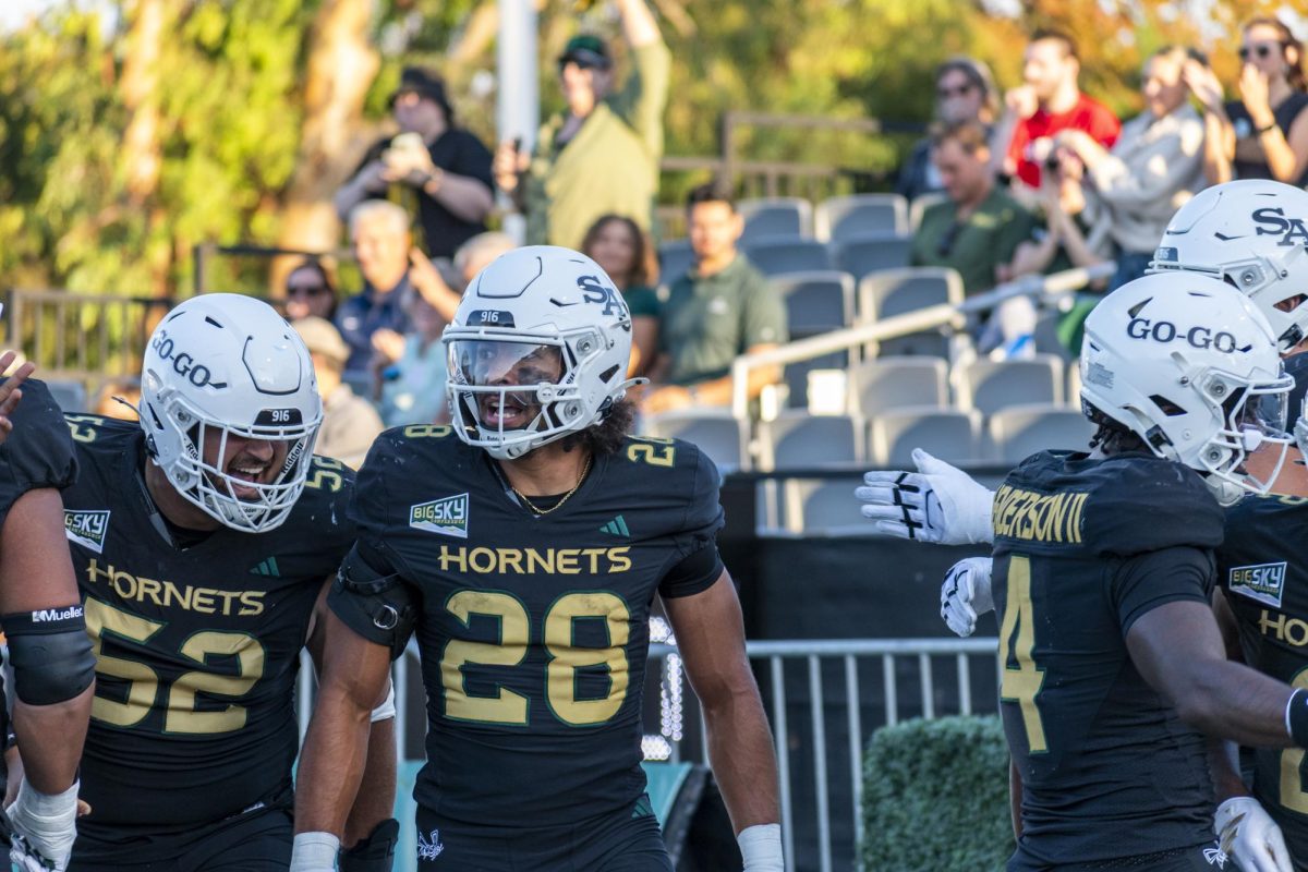 Senior running back Sam Adams II celebrates his touchdown in Sacramento State’s loss to Cal Poly Saturday, Sept. 27, 2025. Adams II has a total of 4 touchdowns this season. 