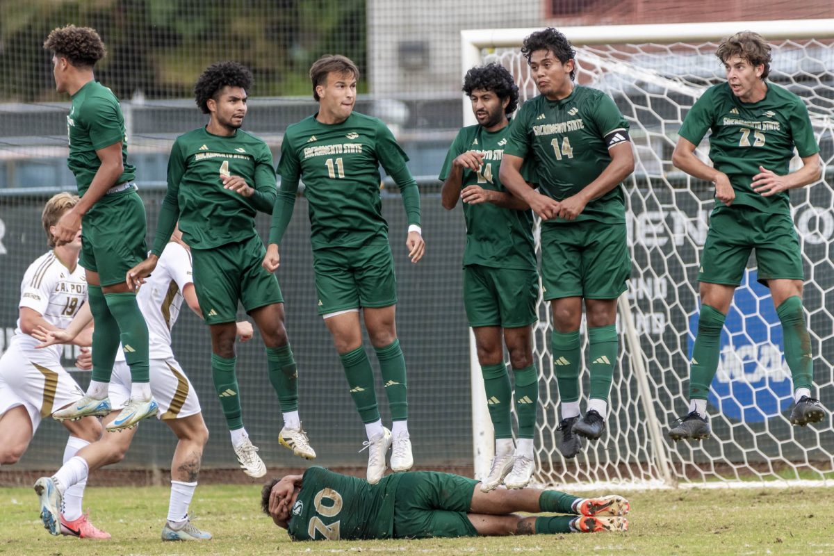 Sacramento State men’s soccer players leap to block a free kick against Cal Poly, Wednesday, Oct. 15, 2025. After jumping out to an early lead, the Hornets conceded a goal, and the match resulted in a draw.