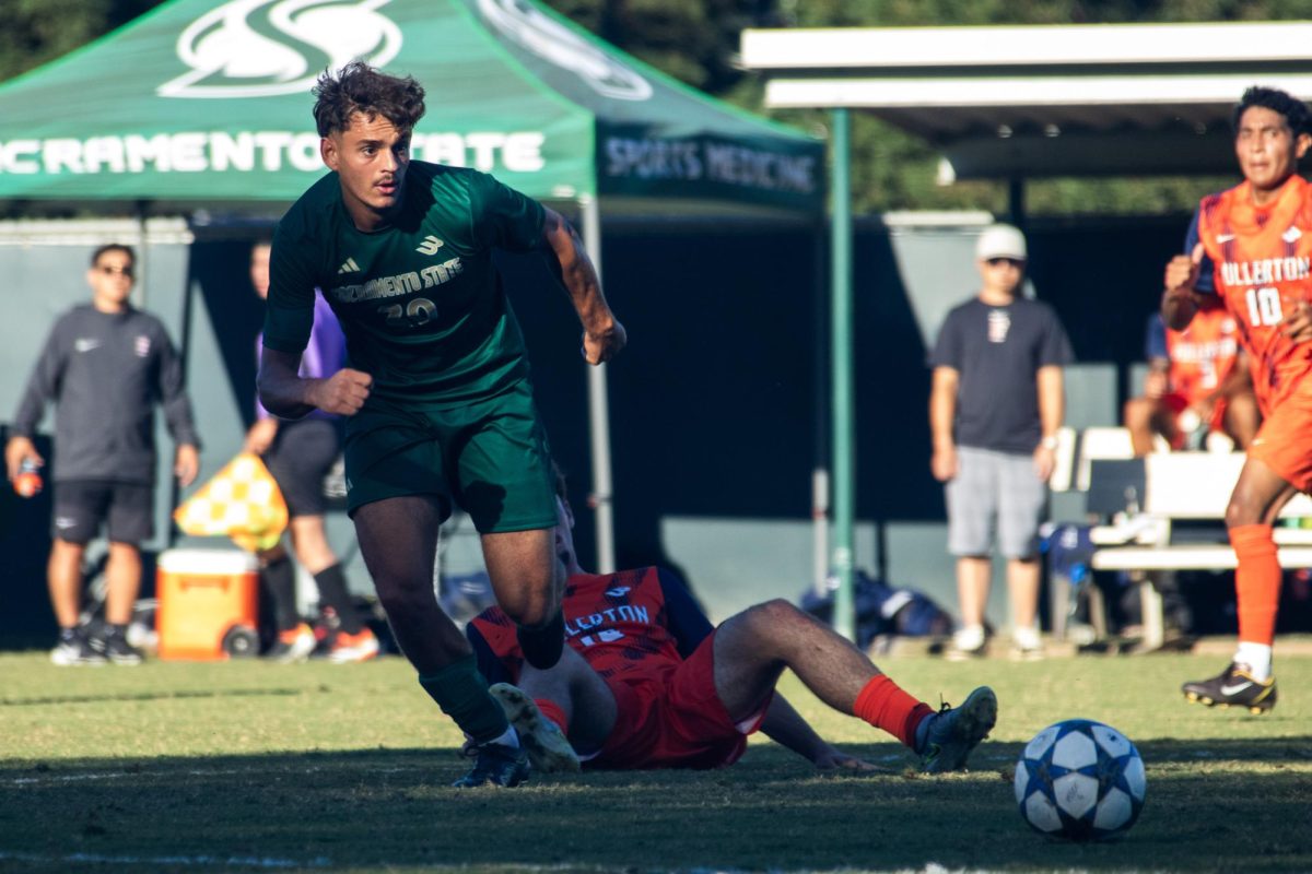 Sophomore midfielder Vincent Padilla battles for a loose ball at home against CSU Fullerton Saturday, Oct. 4, 2025. Sac State’s offensive struggles continued, as they lost the match by a score of 2-1.