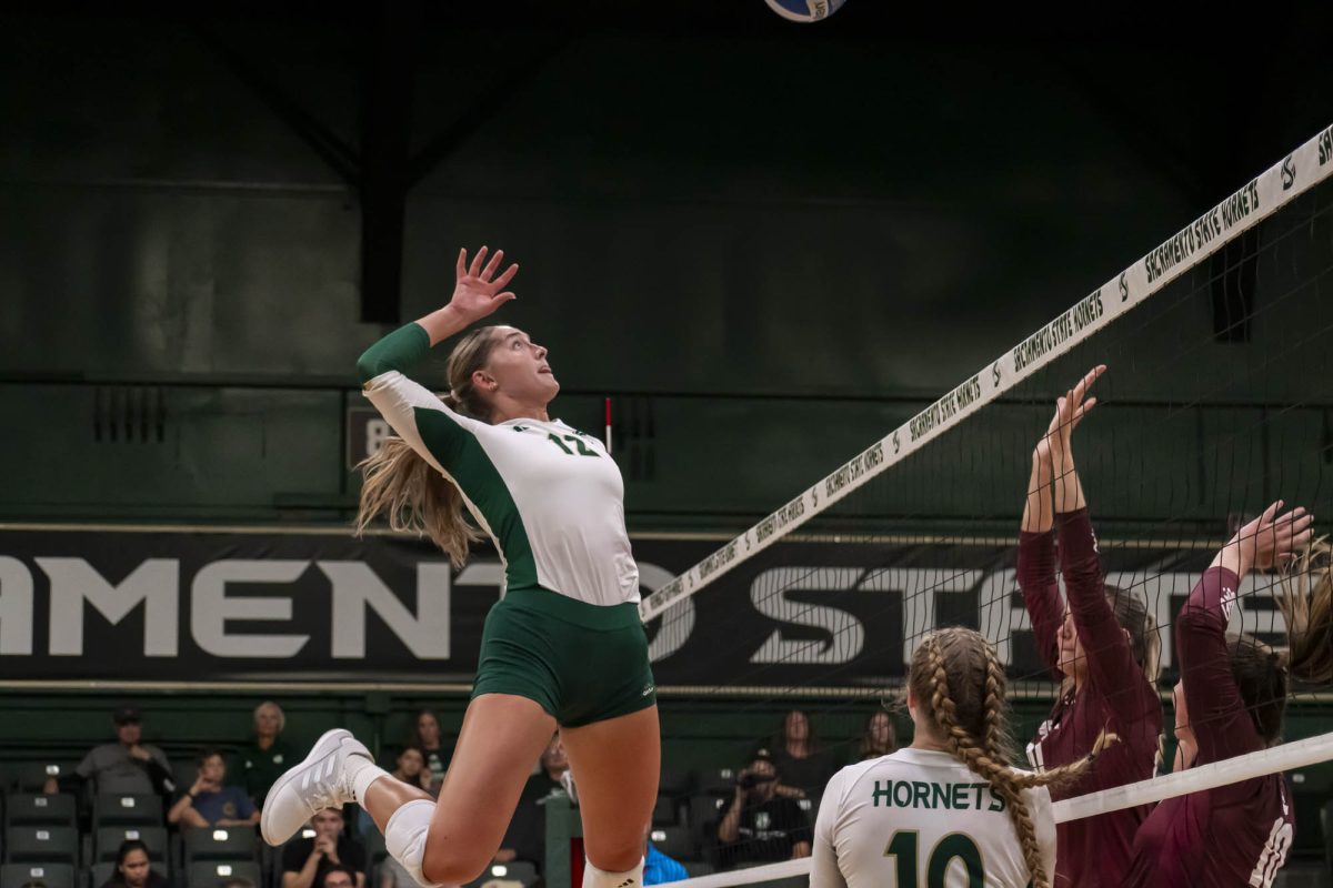 Senior middle blocker Ashlynn Archer goes up for a kill against the Montana Grizzlies Thursday, Oct. 16, 2025. The Hornets won 3-2.