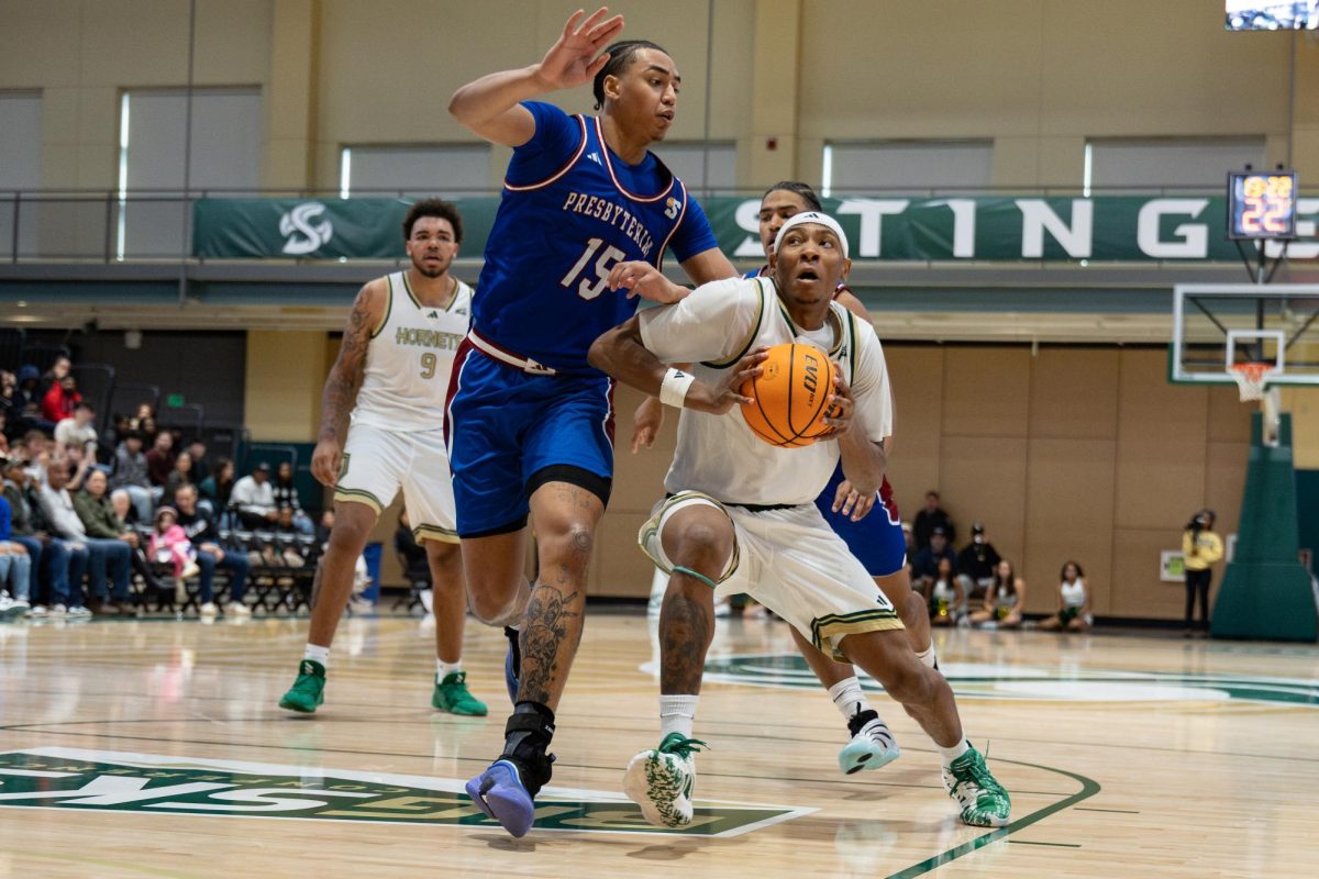 Senior guard Prophet Johnson drives to the hoop against Presbyterian on Sunday, Nov. 16, 2025. Johnson finished the game with eight points and six rebounds against the Blue Hose.